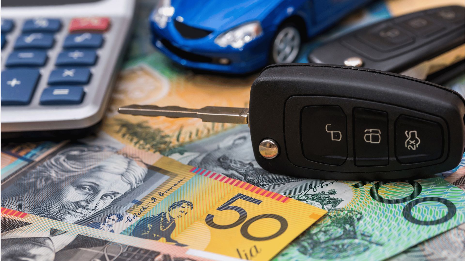 Keys sitting on money | Featured image for the How to Finance a Car with No Deposit – What You Need to Know blog from Fido Finance.