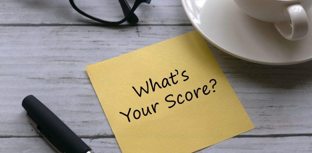Post It Note with "What's Your Score?" written on it | Featured image for the Understanding Your Credit Rating Blog from Fido Finance.