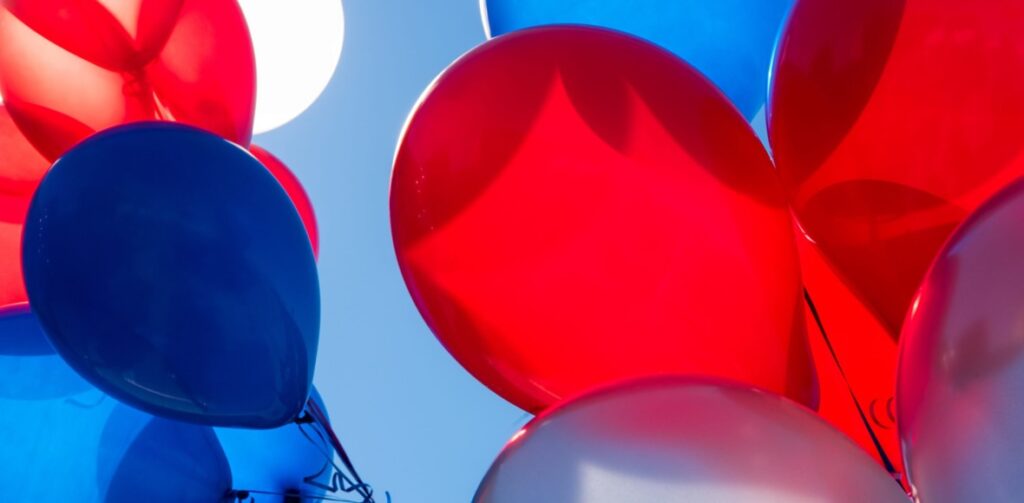 Red, White, and Blue Balloons | Featured image for the What is a Balloon Payment on a Car Blog from Fido Finance.