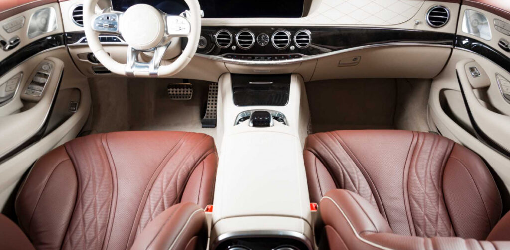 Interior of a modern luxury car | Featured image for the Luxury Car Tax Explained blog from Fido Finance.