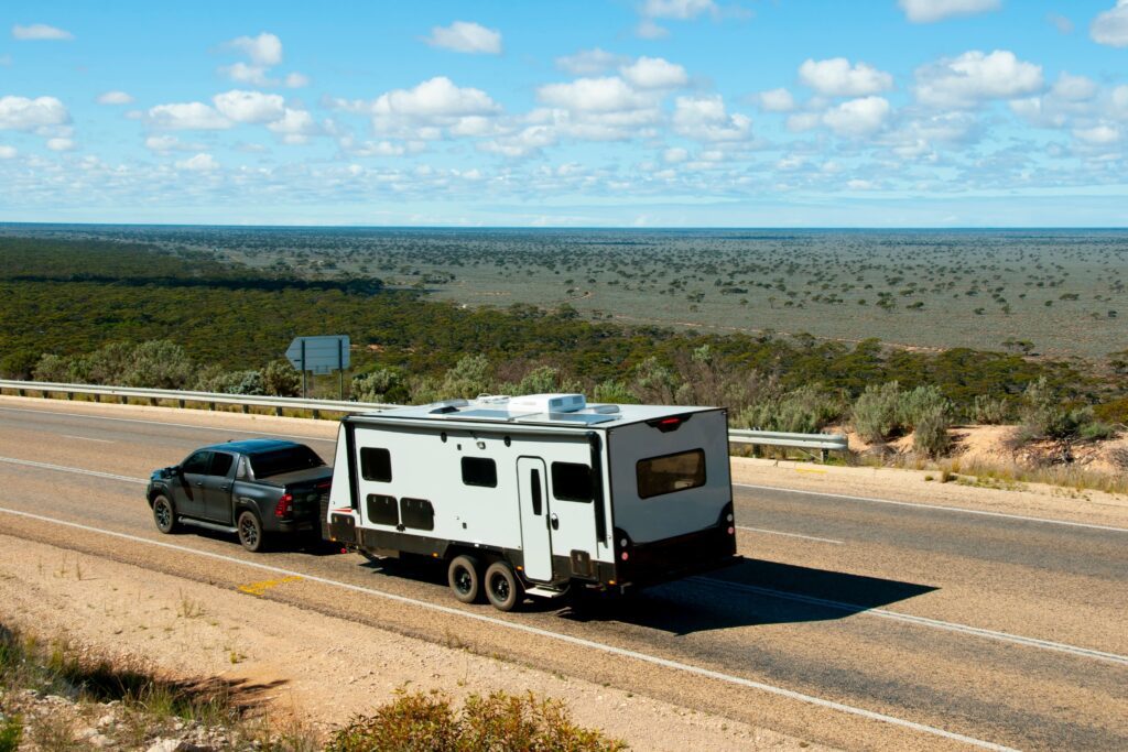 RV Caravan Travelling on Australian Road